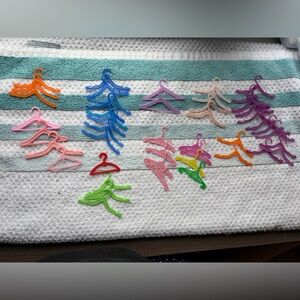 Lot of Colorful Mini Plastic Hangers Barbie Dolls